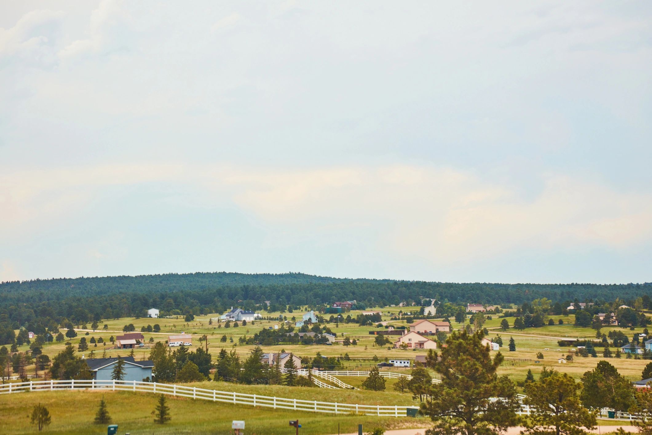Homes in a residential community suitable for location-based fence pricing context